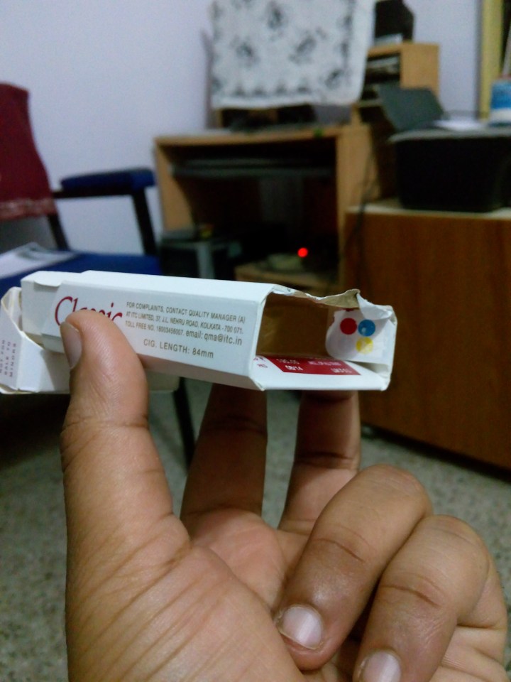 Cigarette pack with a ripped bottom