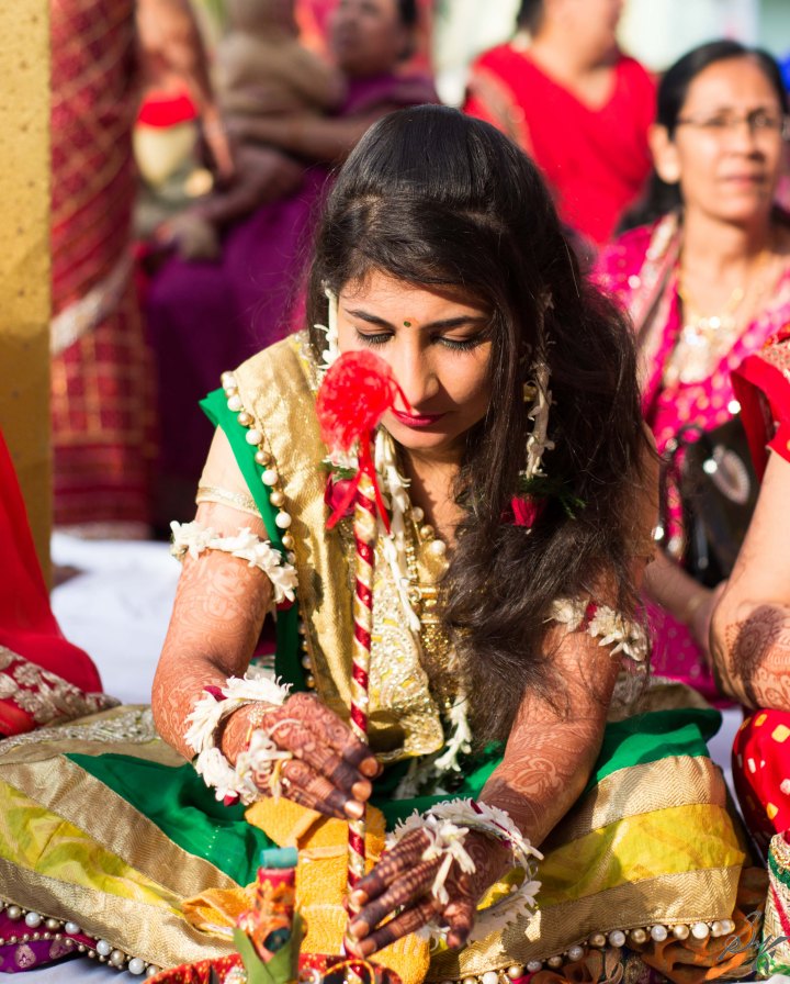 The bride doing the rituals