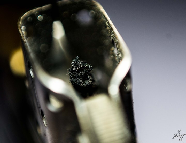 macro close up of the wick of a zippo lighter