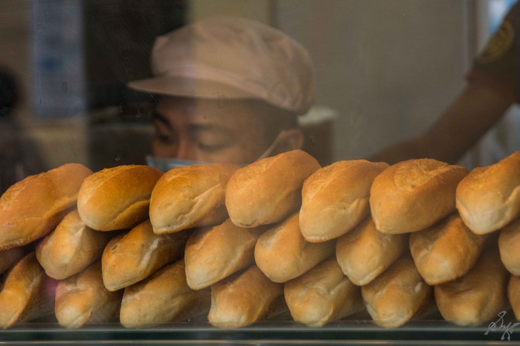 Freshly baked banh mi buns, Hanoi, Vietnam
